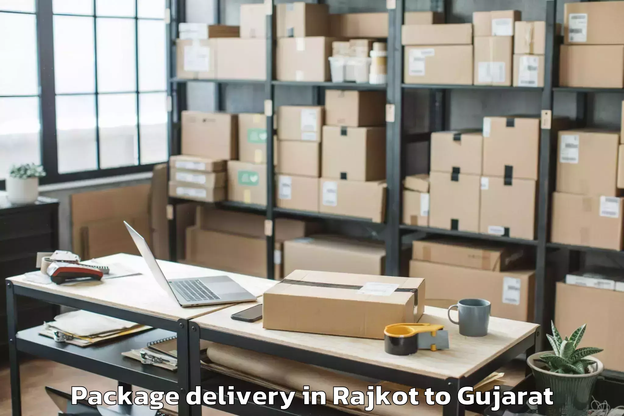 Easy Rajkot to Indus University Ahmedabad Package Delivery Booking